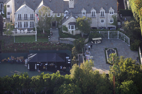 Tom Cruise and wife Katie Holmes Home Tom Cruise and wife Katie Holmes host a party at their Beverly Hills home